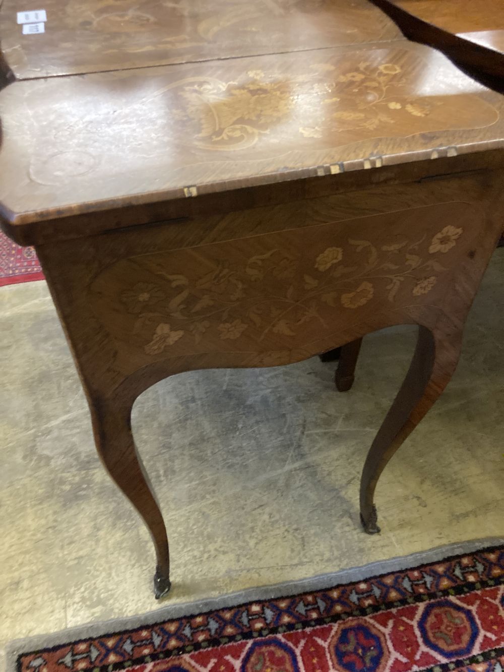 A Louis XV style marquetry inlaid kingwood poudreuse, width 80cm depth 46cm height 74cm